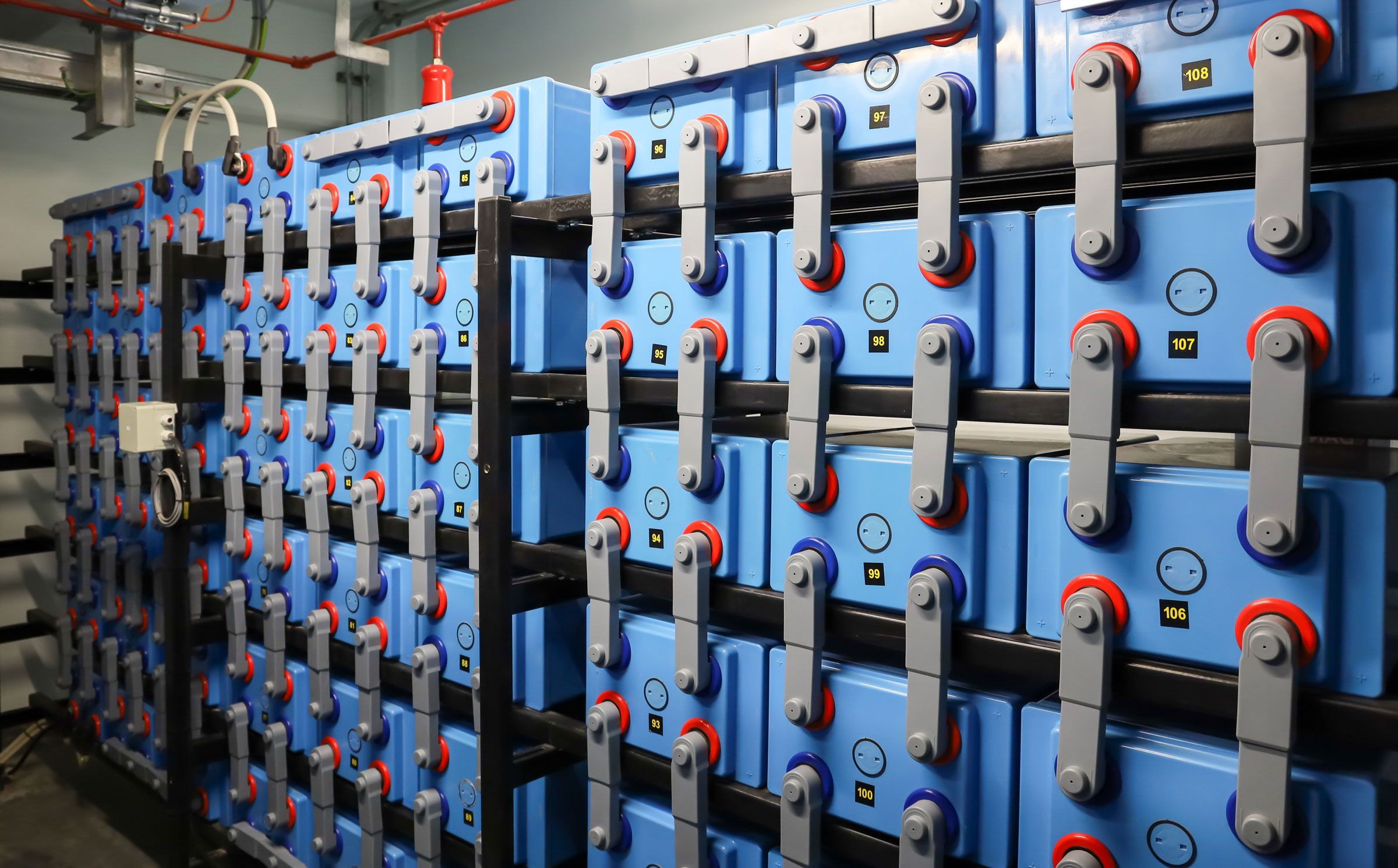 Battery energy storage system at a power plant