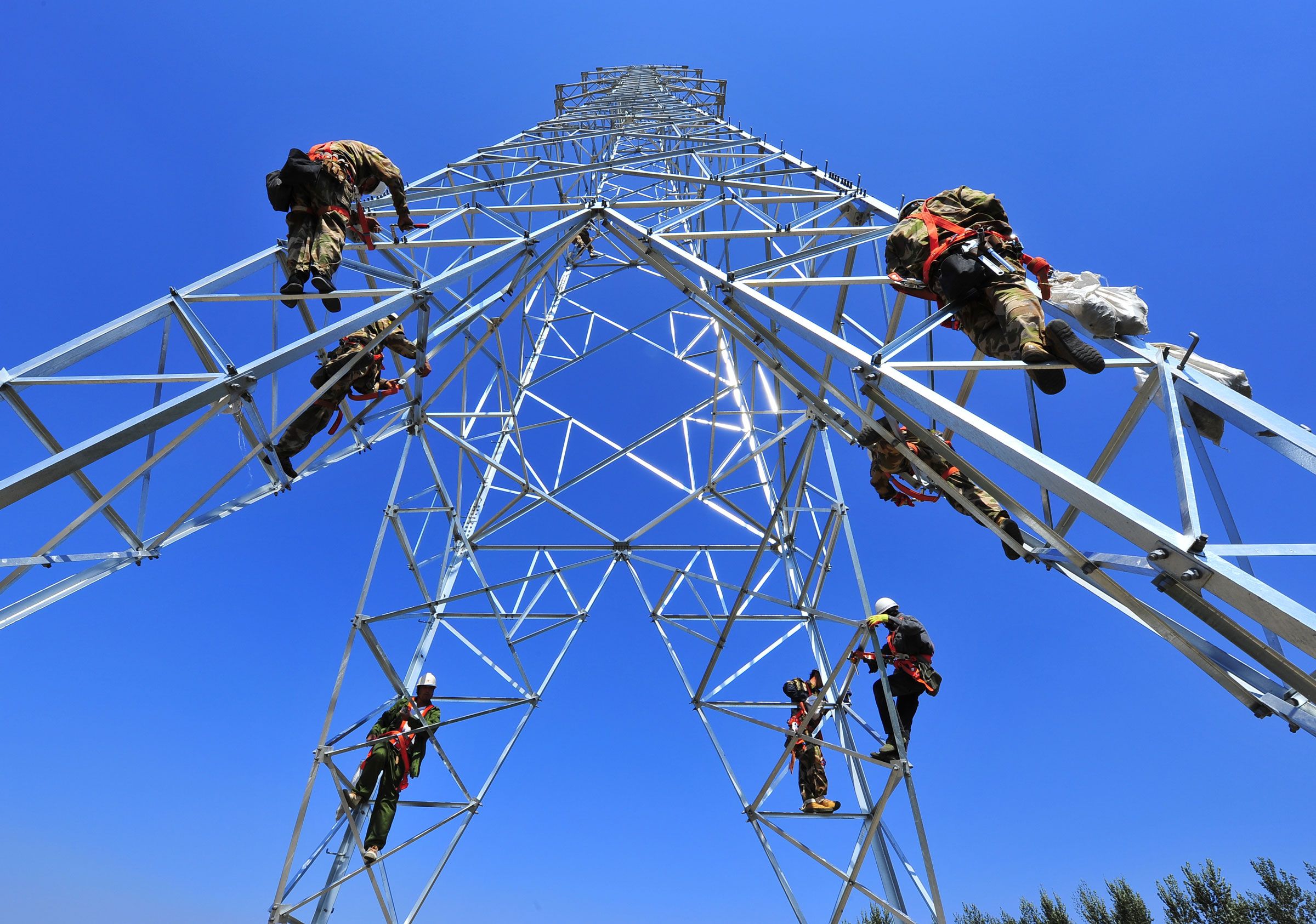 Construction workers on pylon